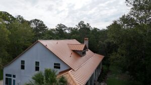 A picture of a house that has metal roofing
