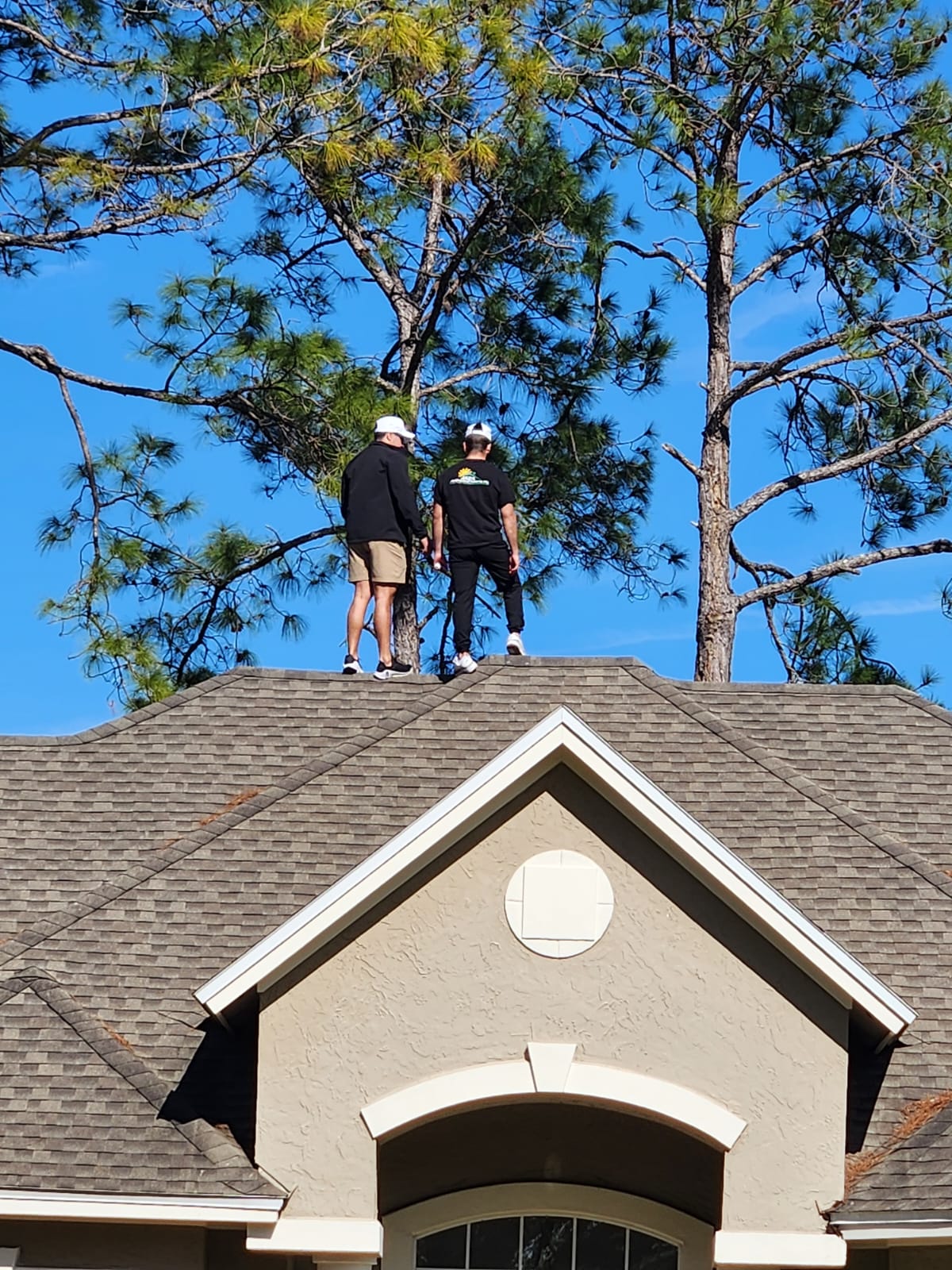 Roofing inspection in Port St. Lucie 2 roofers doing a roofing inspection in Port St. Lucie