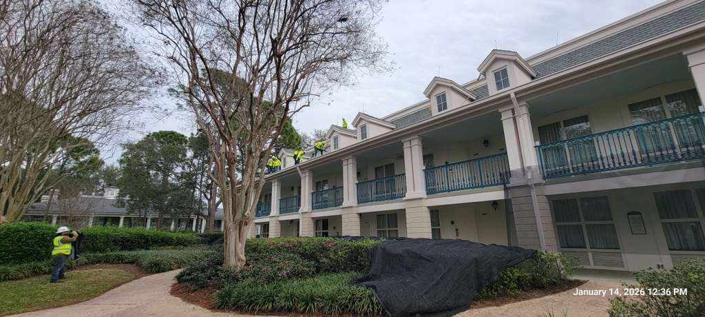 disney-orlando-hotel2 Roofers working in a Disney Resorts roof replacement project
